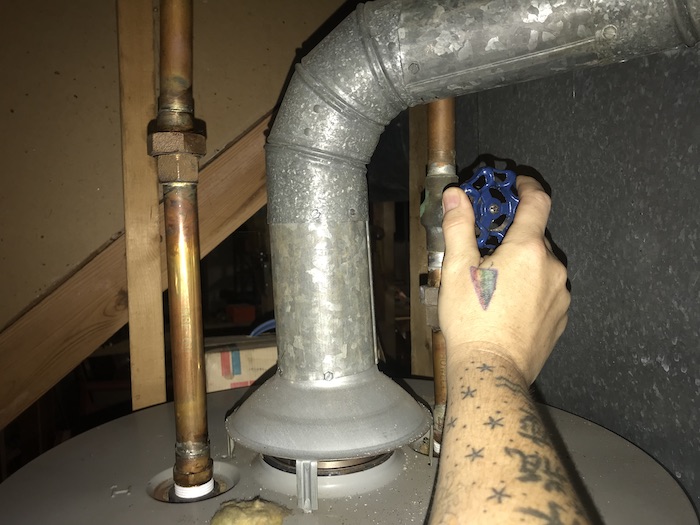Cold water supply knob on cold water line of hot water heater