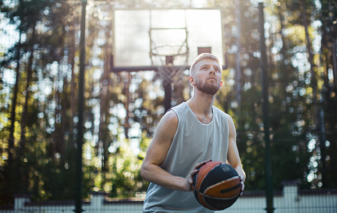 Adjustable basketball goal