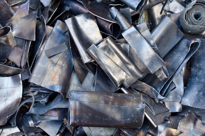 Various scrap metals in a pile.