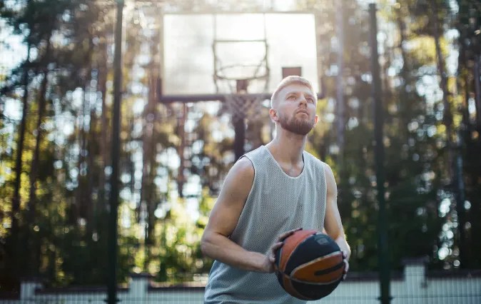 guy playing basketball