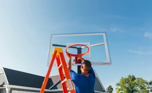 basketball hoop being assembled