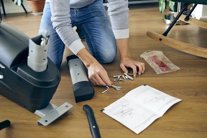 professional assembling a treadmill