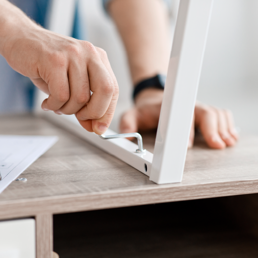 New table being assembled by professional LoadUp handyman