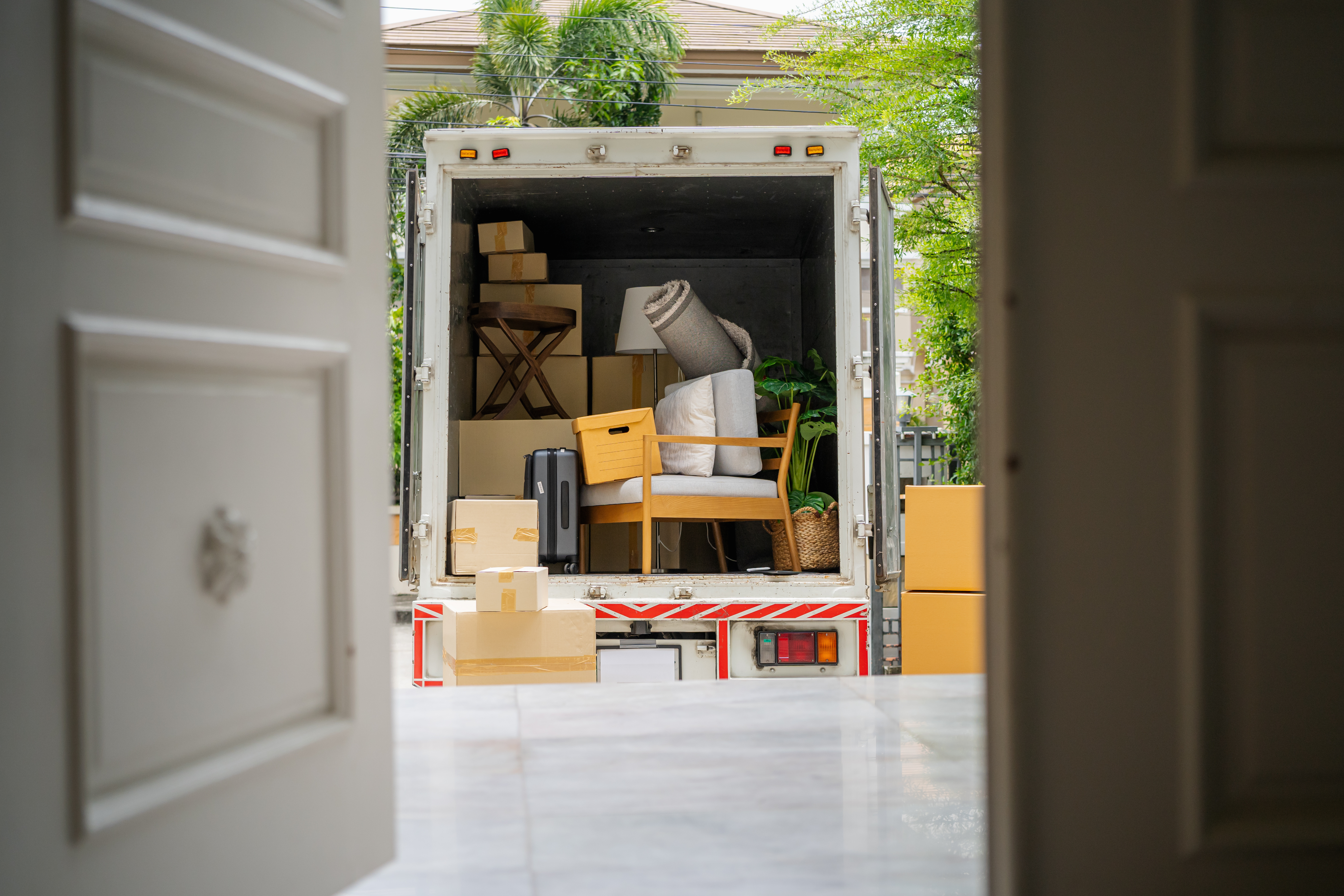 Donation delivery service box truck full of items to be taken to donation center