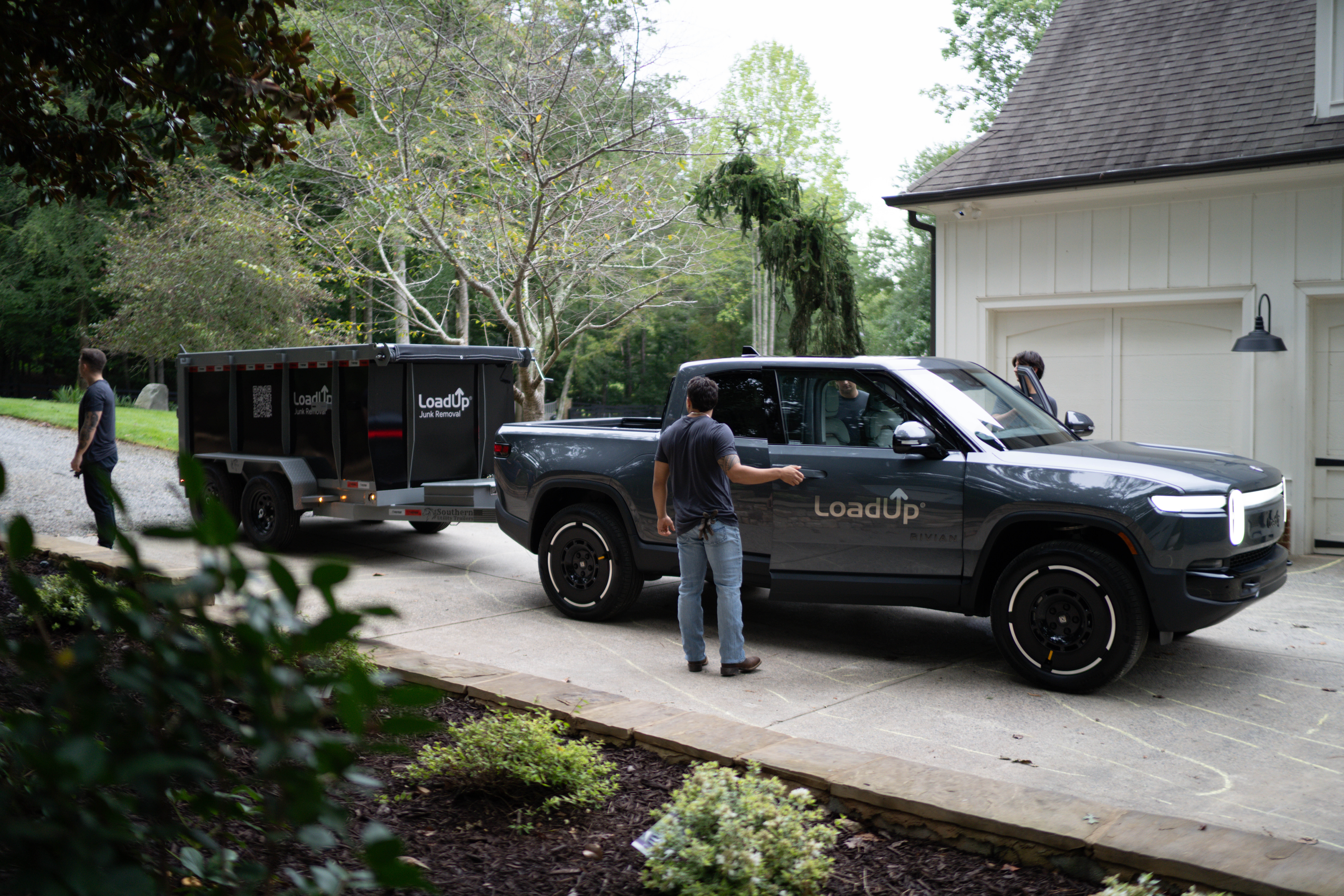 Loaders arriving on site to a customer's residence