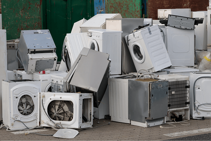 Pile of old appliances and scrap removal